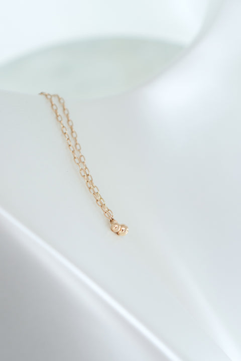 Golden planet pendant