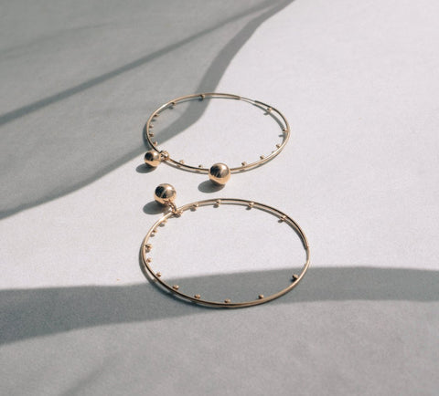 Golden planet pendant